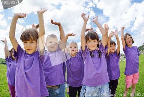 Image of happy kids group  have fun in nature