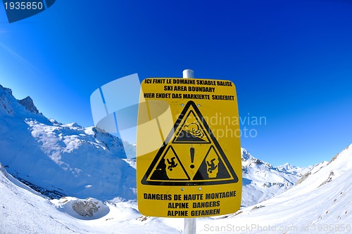 Image of Sign board at High mountains under snow in the winter