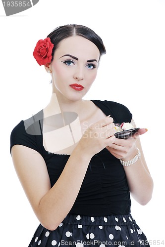 Image of beautiful young woman eat sweet cake