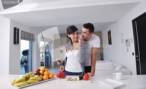 Image of young couple have fun in modern kitchen