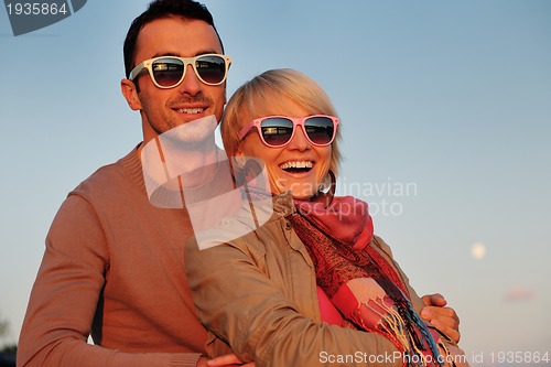 Image of couple in love  have romantic time on boat