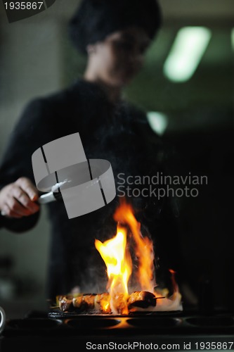 Image of chef preparing meal