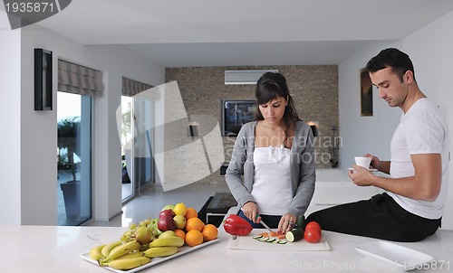 Image of young couple have fun in modern kitchen
