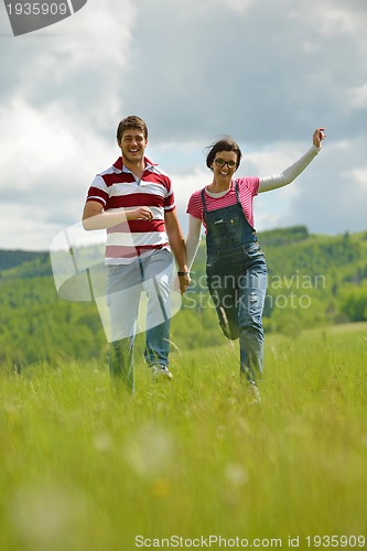 Image of romantic young couple in love together outdoor