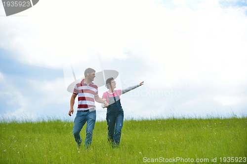 Image of romantic young couple in love together outdoor