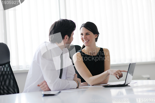 Image of business people in a meeting at office