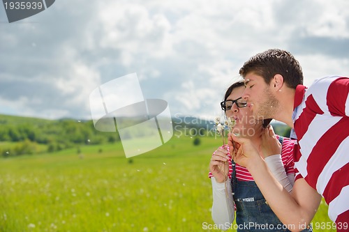 Image of romantic young couple in love together outdoor