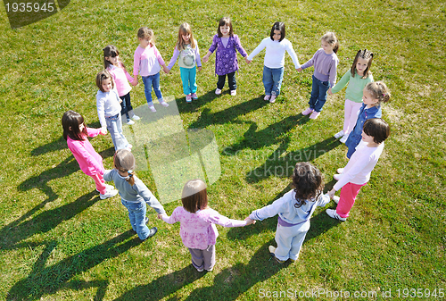 Image of preschool  kids outdoor have fun