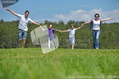 Image of happy young family have fun outdoors