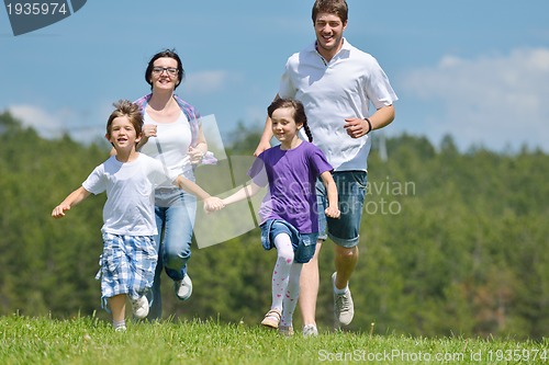 Image of happy young family have fun outdoors