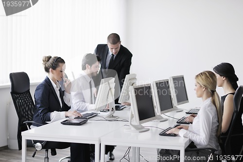 Image of business people group working in customer and help desk office