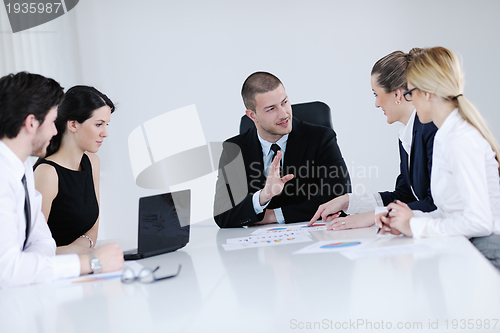 Image of business people in a meeting at office