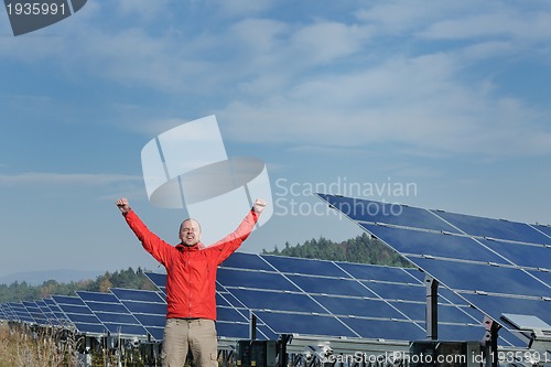 Image of Male solar panel engineer at work place