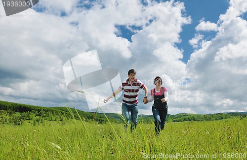 Image of romantic young couple in love together outdoor