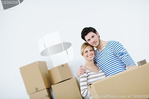 Image of Young couple moving in new house