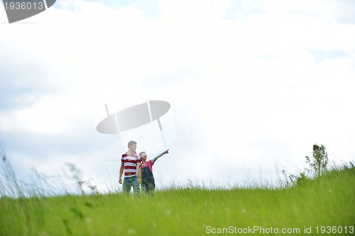 Image of romantic young couple in love together outdoor