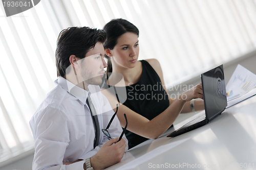 Image of business people in a meeting at office