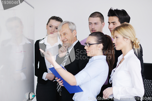 Image of Senior business man giving a presentation