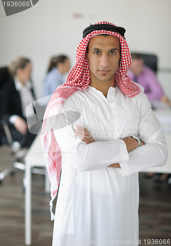 Image of Arabic business man at meeting