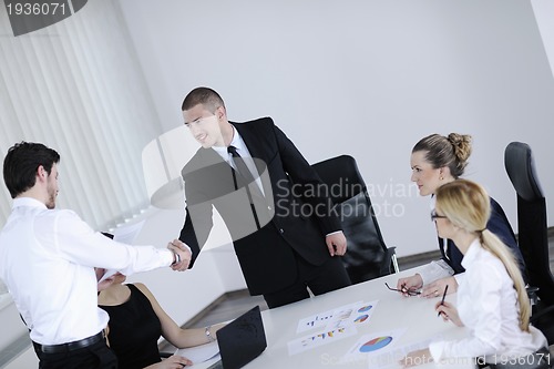 Image of business people in a meeting at office