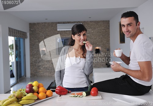 Image of young couple have fun in modern kitchen