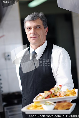Image of chef preparing meal