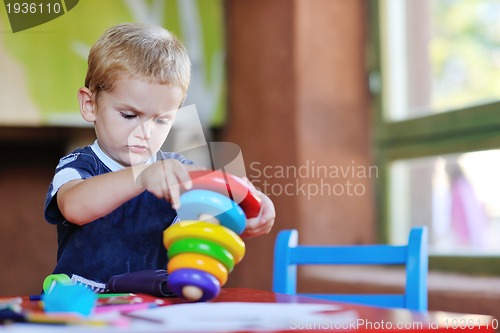 Image of cute little child play and have fun