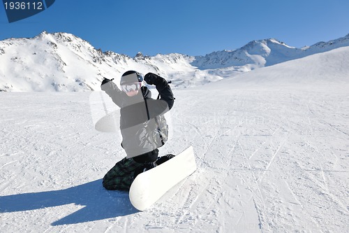 Image of skiing on fresh snow at winter season at beautiful sunny day