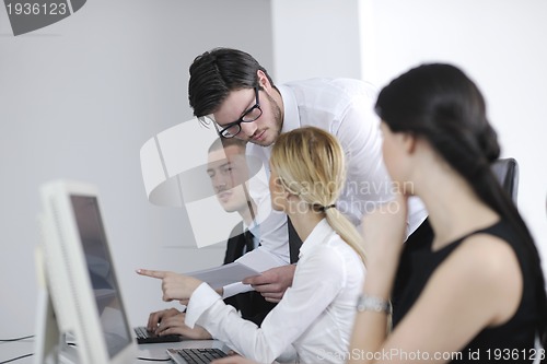 Image of business people group working in customer and help desk office