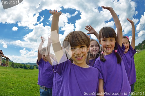 Image of happy kids group  have fun in nature