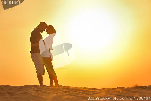 Image of couple enjoying the sunset