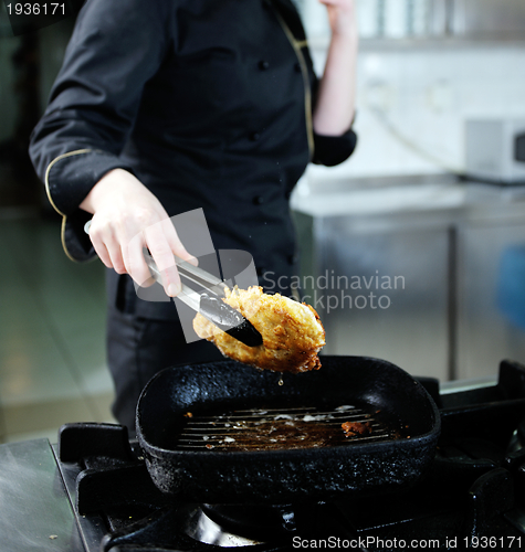 Image of chef preparing meal