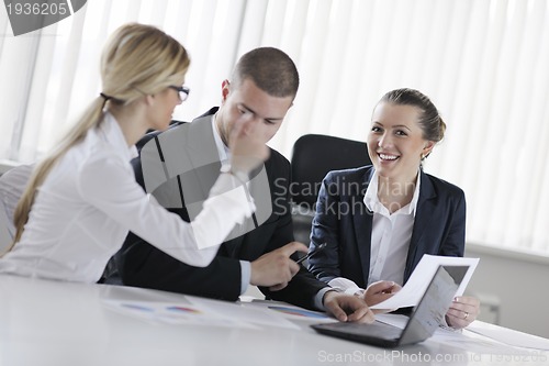 Image of business people in a meeting at office