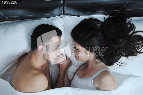 Image of young couple have good time in their bedroom