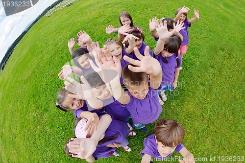 Image of happy kids group  have fun in nature