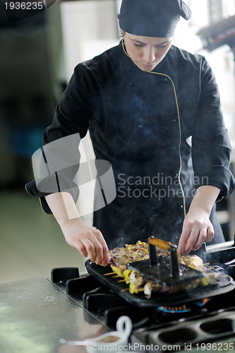 Image of chef preparing meal