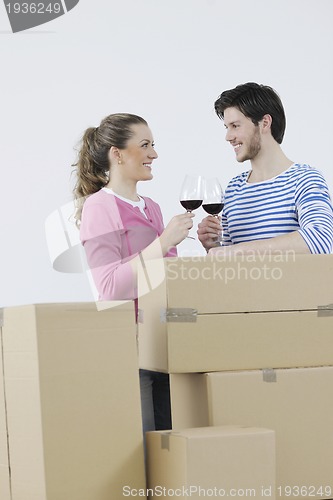 Image of Young couple moving in new home