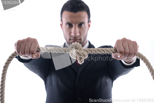 Image of business man with rope isolated on white background