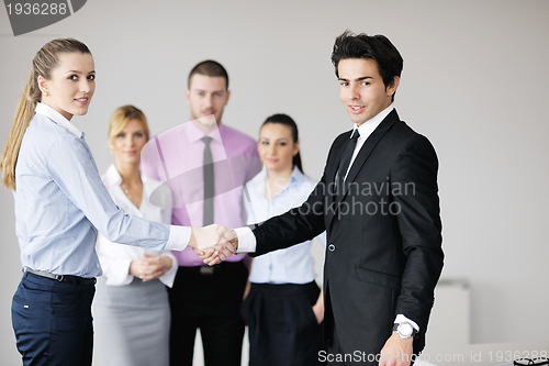 Image of Group of young business people at meeting