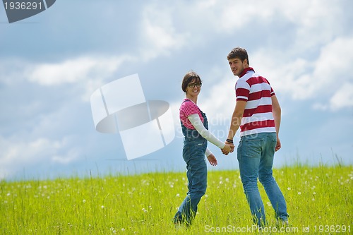 Image of romantic young couple in love together outdoor
