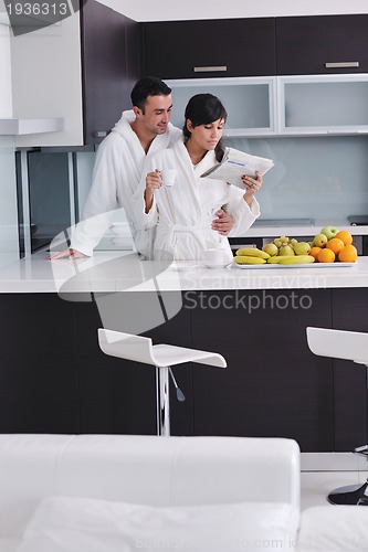 Image of young couple have fun in modern kitchen