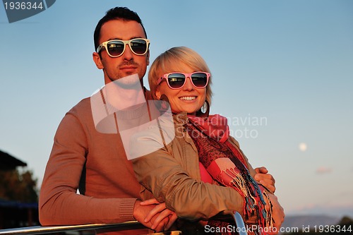 Image of couple in love  have romantic time on boat