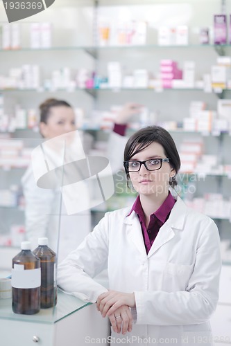 Image of team of pharmacist chemist woman  in pharmacy drugstore