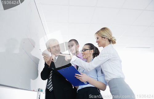 Image of Senior business man giving a presentation