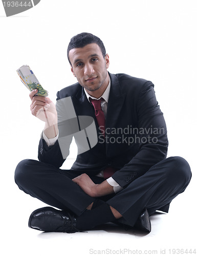 Image of Business man holding money