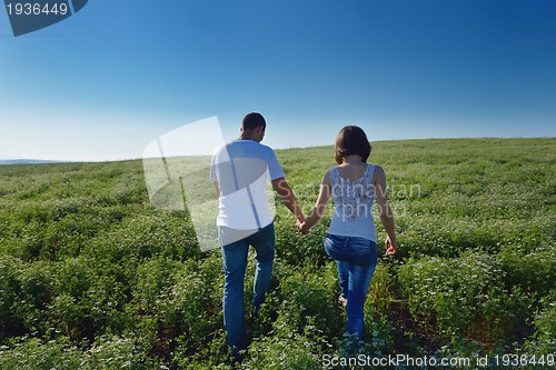 Image of happy couple in wheat field
