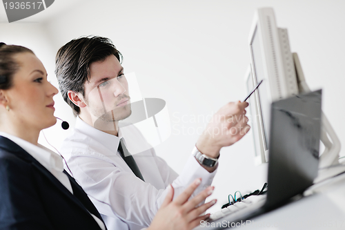 Image of business people group working in customer and help desk office