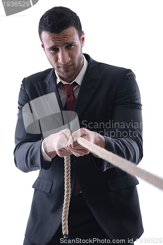 Image of business man with rope isolated on white background