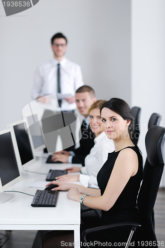 Image of business people group working in customer and help desk office