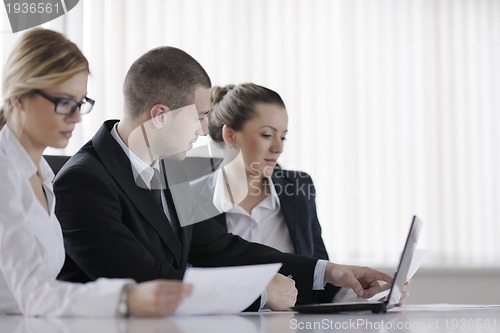 Image of business people in a meeting at office